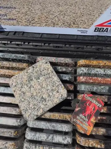 The sample case open on a visit, real stone blends in rows